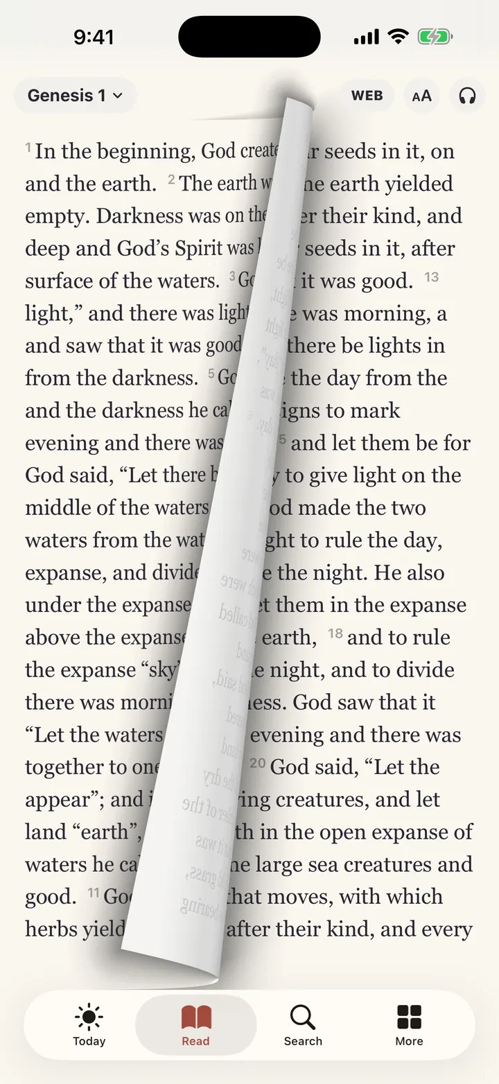Bible reader showing Genesis 1 with a realistic page-turn animation